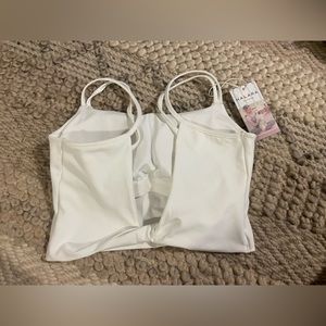 Halara twist crop top- white. Double strapped. Has a twist in the back.